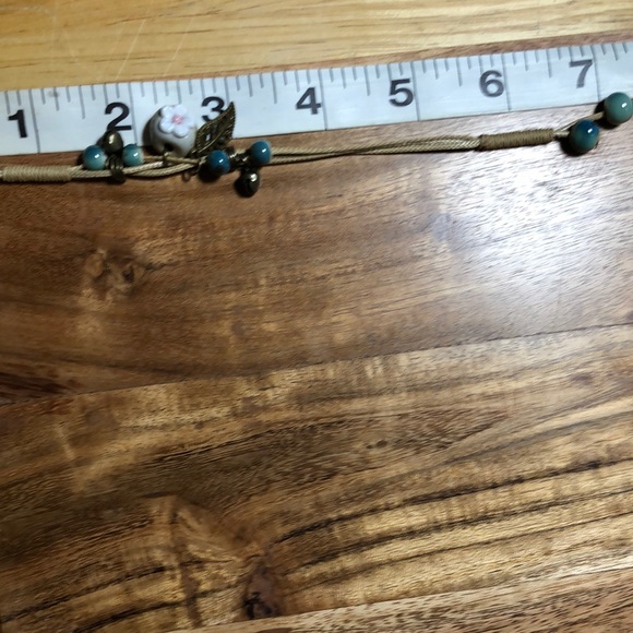 3/$25 Green Bead with Flower and Leaf Charms on Rope Bracelet - Picture 2 of 6